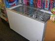 Retail Chest Freezere Six Months old ,  Sliding Glass top....